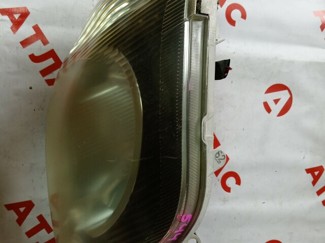 Фара TOYOTA Corolla Fielder 