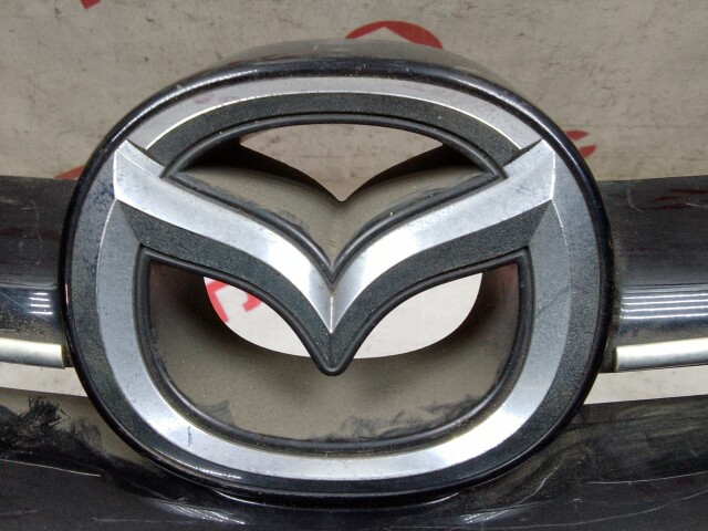 Бампер передний MAZDA Demio 