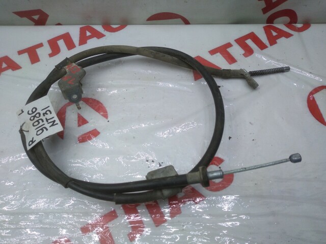 Трос ручника NISSAN X-Trail 