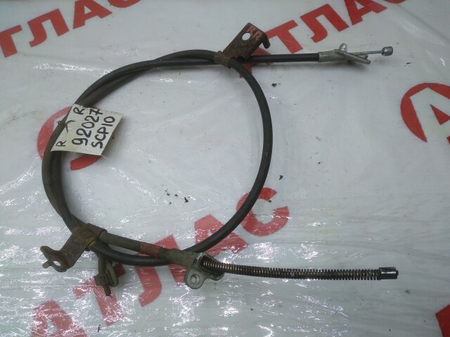 Трос ручника TOYOTA Vitz 