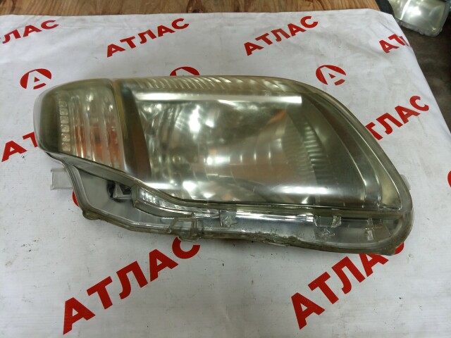 Фара TOYOTA Corolla Fielder 
