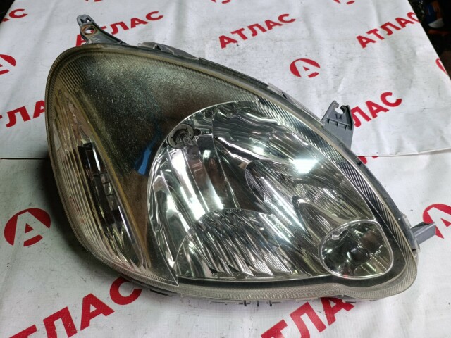 Фара TOYOTA Vitz 