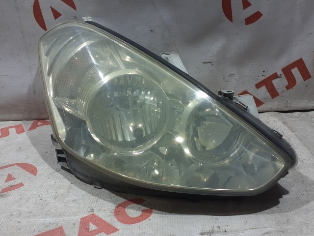 Фара TOYOTA Caldina 