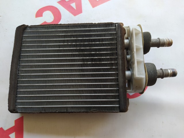 Радиатор печки MAZDA Familia 