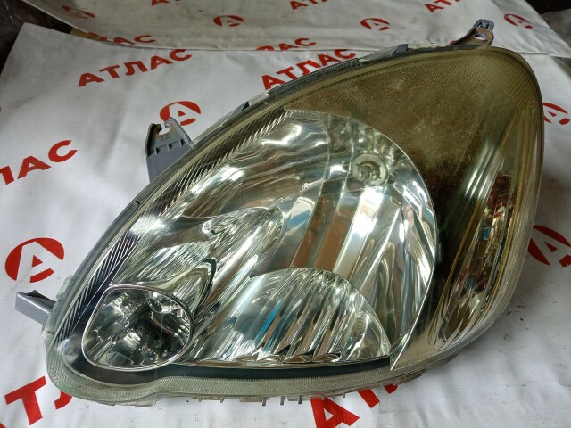 Фара TOYOTA Vitz 