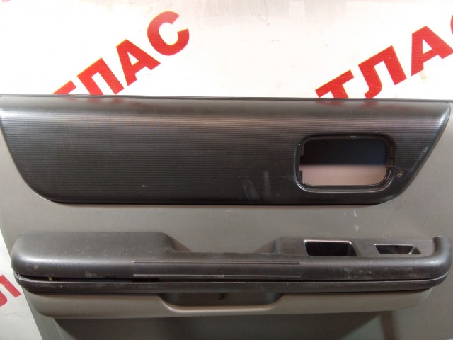 Обшивка двери NISSAN X-Trail 