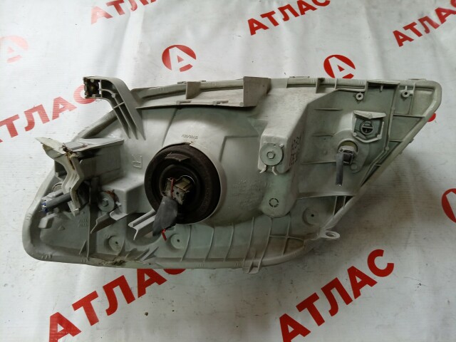 Фара TOYOTA Corolla Fielder 