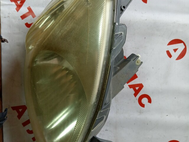 Фара TOYOTA Vitz 