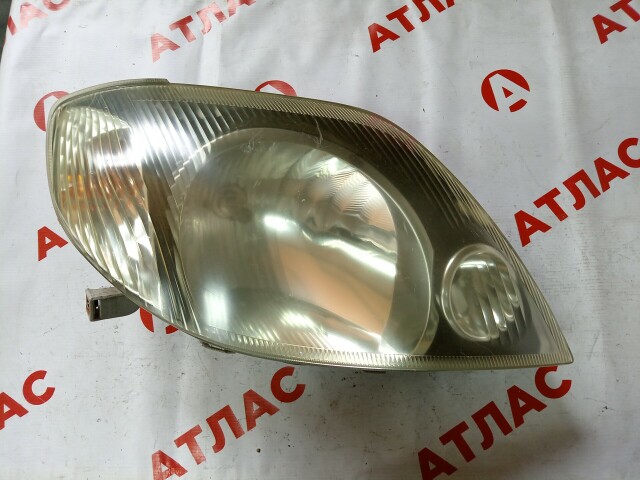 Фара TOYOTA Corolla Fielder 