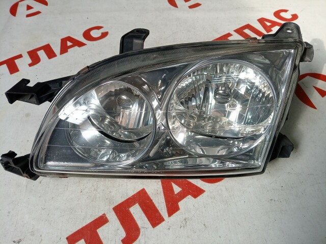 Фара TOYOTA Caldina 