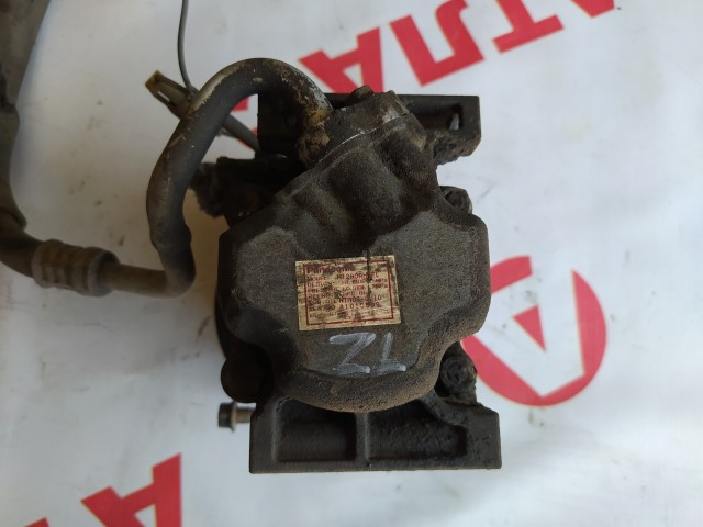 Компрессор кондиционера MAZDA Familia 