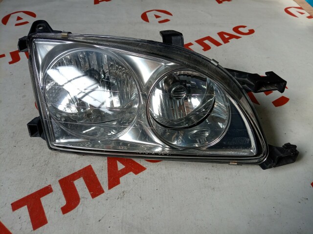 Фара TOYOTA Caldina 