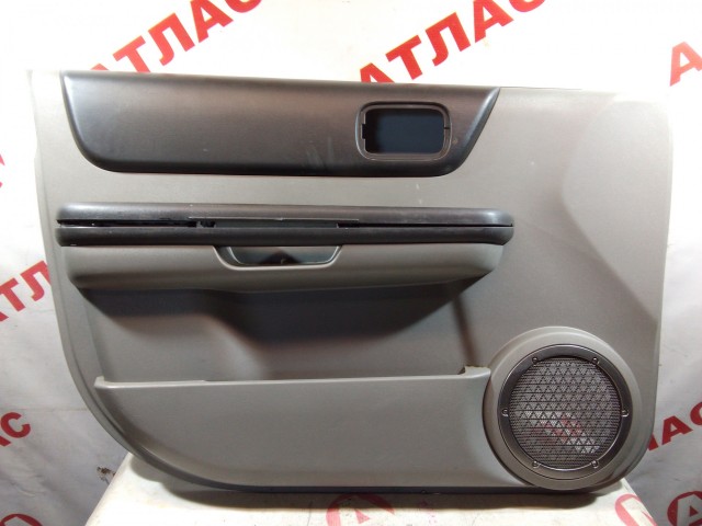 Обшивка двери NISSAN X-Trail 